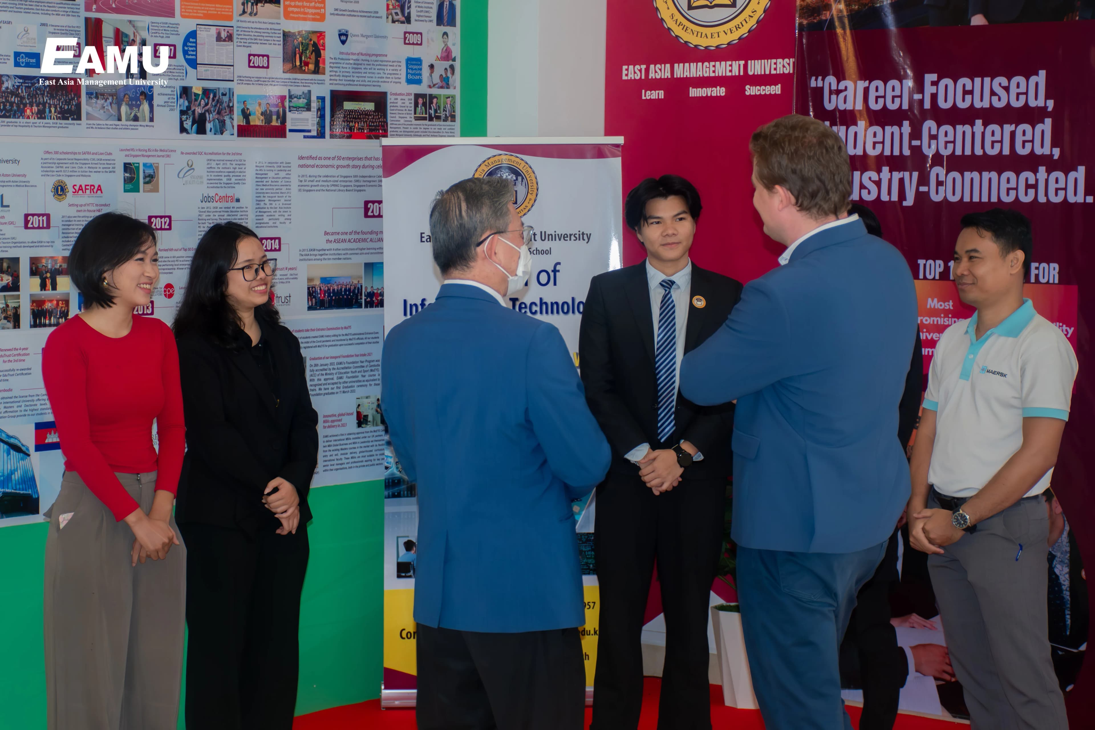 EAMU interns with Phillip Bank staff after an internship presentation